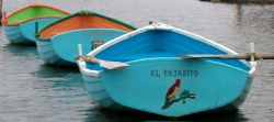 row boats used by guests at hotelito desconcito by Laurence Hegarty 